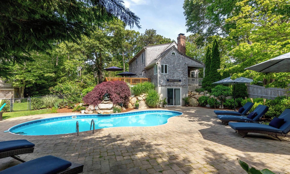 Eastham House | Beautiful Eastham home featuring lush gardens with heated in ground pool