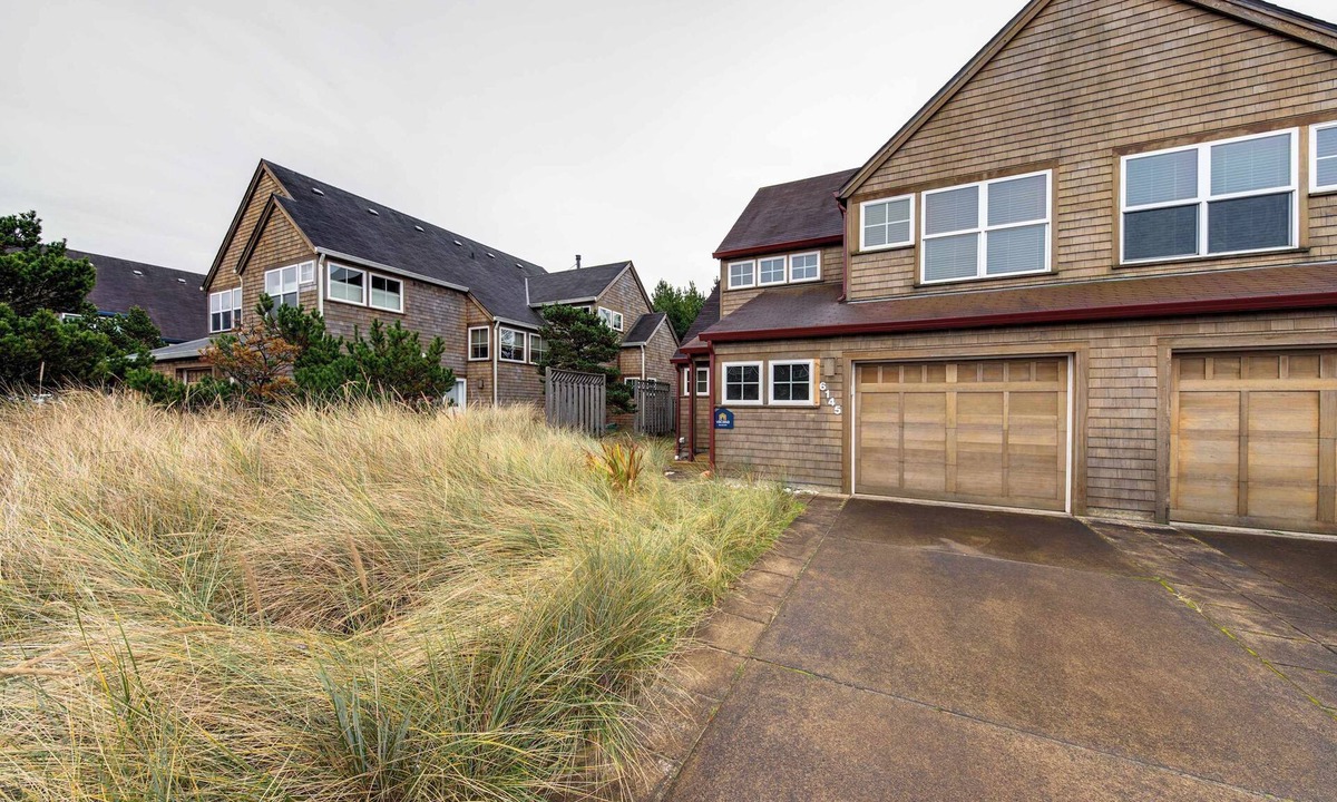 Shorepine Village House | Beautiful modern home with great beach access fireplace and outdoor shower