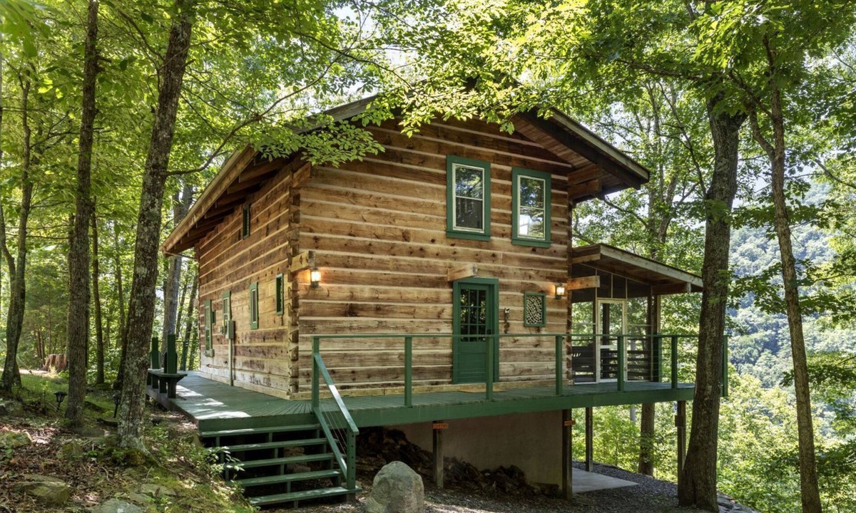 Marshall Cabin | Beautiful Rustic Cabin Surrounded by Nature with Incredible Views and a Wrap-Around Deck for an Amazing Glamping Experience in Marshall, NC