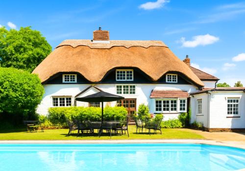 Chichester House | Beautiful Thatched Cottage with Outdoor Pool, Secure Garden, Dog & Family Friendly! Chichester Holiday Properties