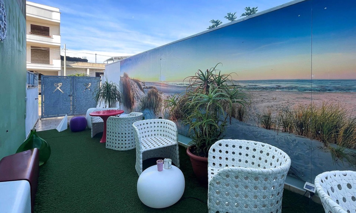 Aradeo Apartment | Beautiful vacation home with common courtyard and bar area.