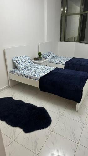 Sharjah Hostel | Bed space in Luxury hostel - سرير مفردفي شقة فندقية