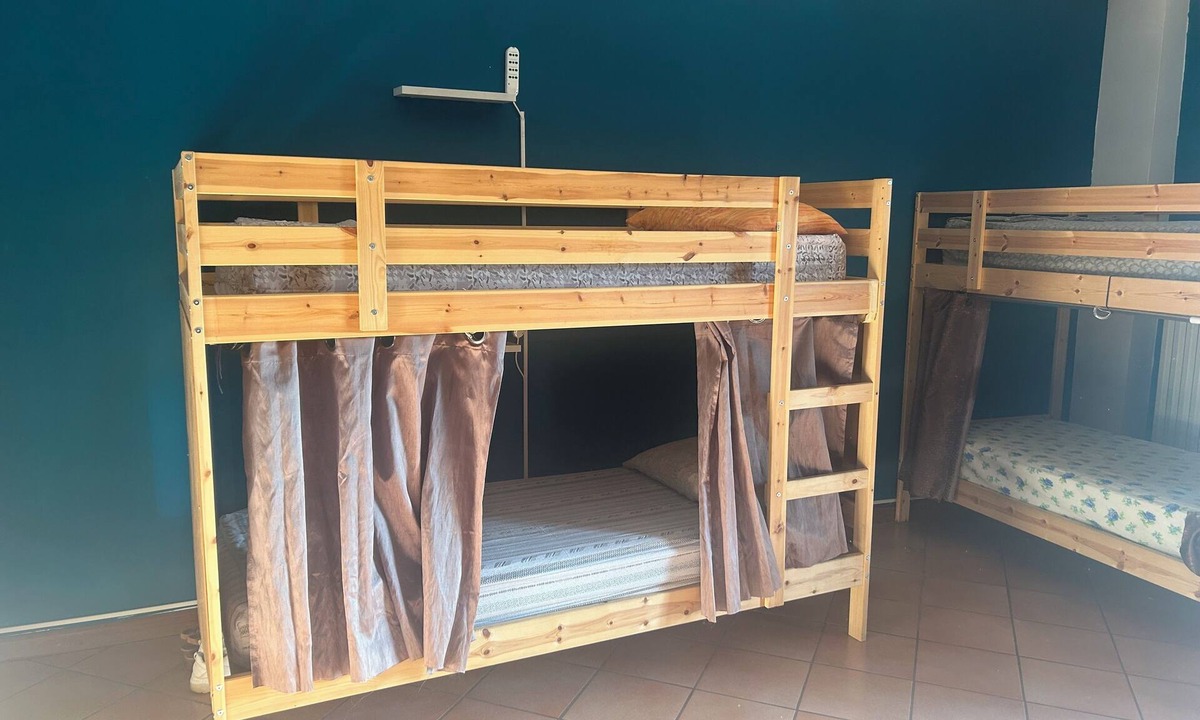 Busto Garolfo House | Beds in shared room