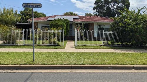 Bidwill House | BIDWILL GARDENS ON MIDDLETON - 2 Rooms A Private Room with a King-Size Bed or Open Lounge Room Floor Mattress SHARED Bathroom FREE Kitchen Essentials FREE Laundry Facilities Fast WIFI HDTV NETFLIX, YOUTUBE, KAYO Meal and Transport Service Available