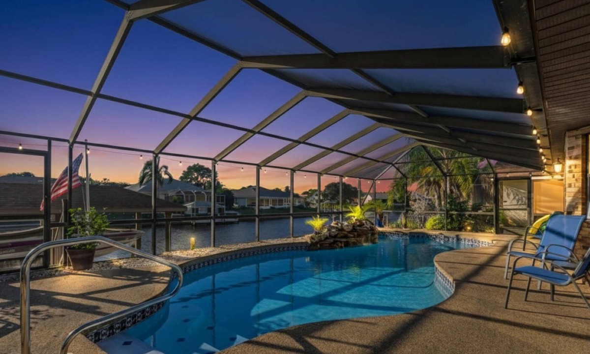Palm Harbor House | Blue Haven Large Waterfront Pool Home | Boat Dock | Canal | Water Views | Pool Bar | WIFI | Fishing