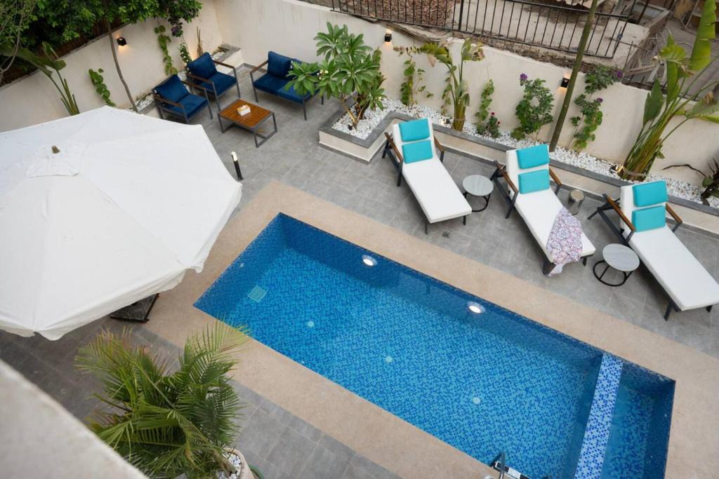 Maadi Apartment | Book Now,Before it's Gone at 88- #74 Pool-Clubhouse by Spacey