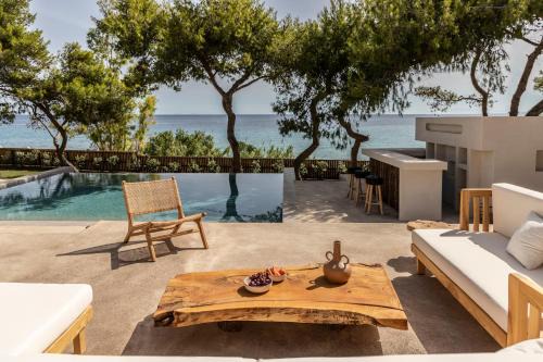 Amoudi Villa | Bozonos Villa - Beachfront Simplicity with Heated Pool