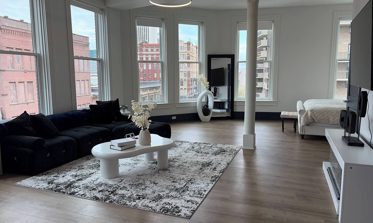 Central Business District Apartment | Bright Sunlit Studio in Downtown Rochester Floor-to-Ceiling Windows