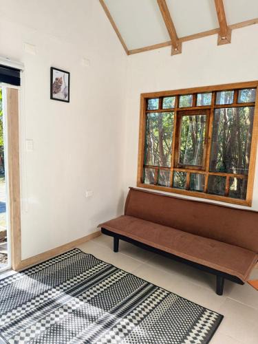 Puqueldon House | Cabaña entre arrayanes de Detif