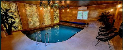 Ocolis Cabin | Cabana Moldovan Baisoara cu piscina interioara, ciubar, spa