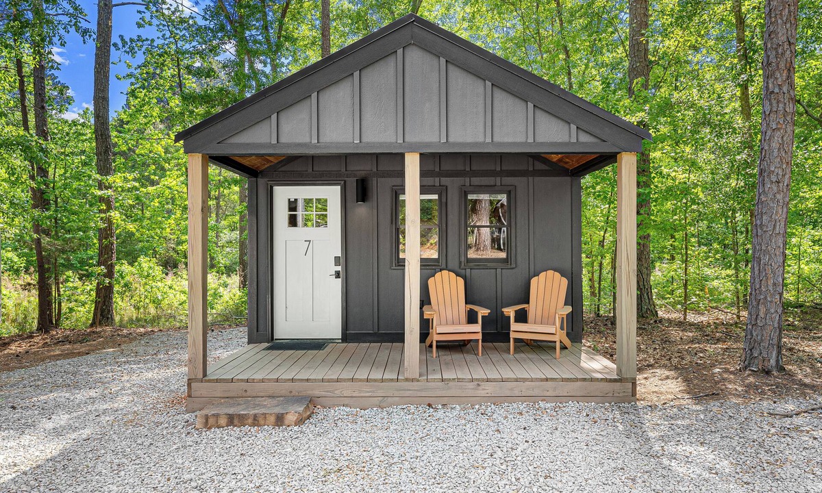 Hartwell RV Rental | Cabin #7: One king-size bed, a kitchenette, and a large gravel parking pad beside the cabin for easy boat or trailer storage.