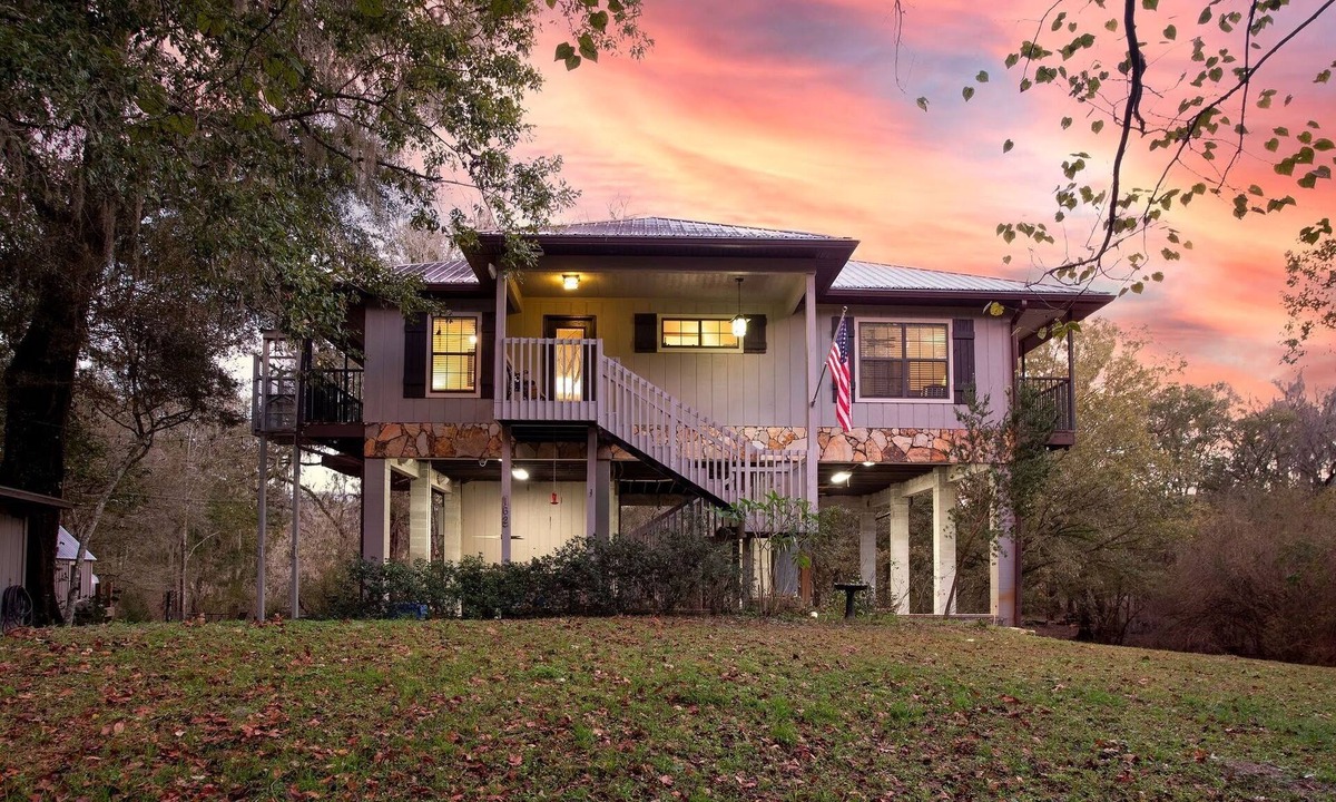 Fort White Cabin | Camp Manatee - Riverfront Cabin, Stunning Views, Pet-Friendly, Hot tub + Kayaks!