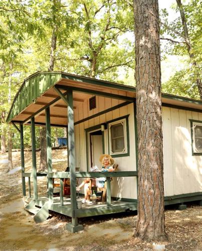 Branson House | Camper Cabin Escape with Fire Pit and Covered Porch in Branson, Missouri