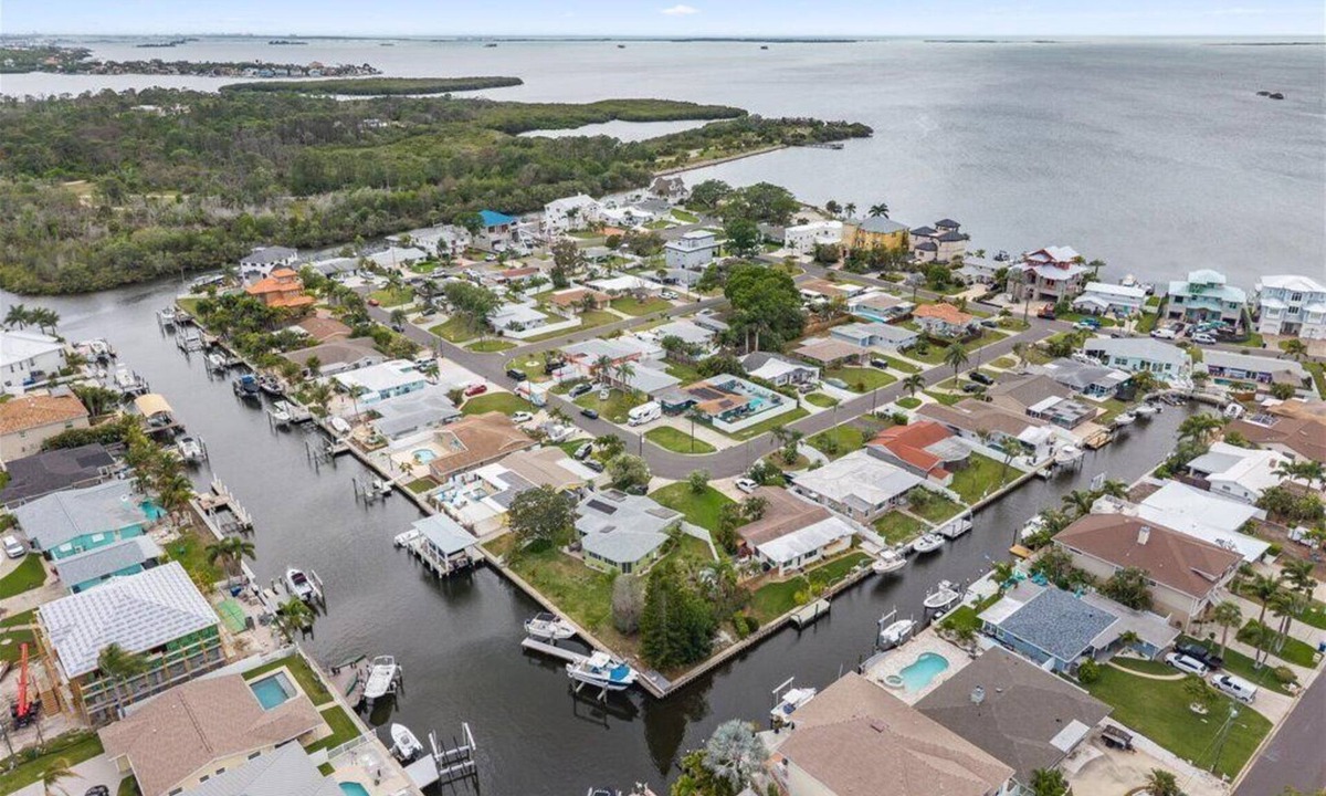 Baywood Village House | Canal Front Paradise with Serene Waterfront Setting, Bonus Room