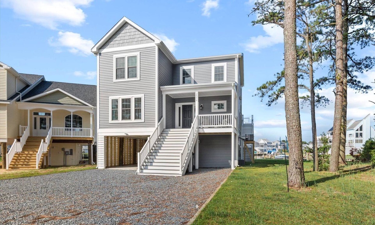 Captain's Cove House | Canalfront home with bulkhead by Seaside Vacations & Sales