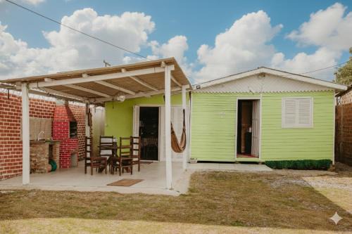 Querencia House | Casa com Churrasqueira, Quintal, Ar Cond e Garagem
