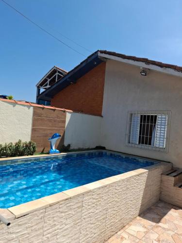 Raul Cury House | Casa com churrasqueira e piscina
