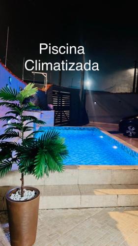 Santa Terezinha House | Casa com piscina climatizada em Itanhaém!