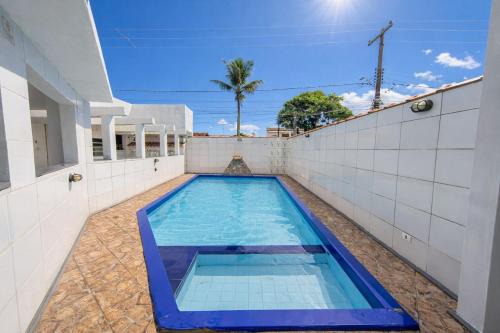 Itanhaem House | Casa com Piscina e Churrasqueira no Savoy