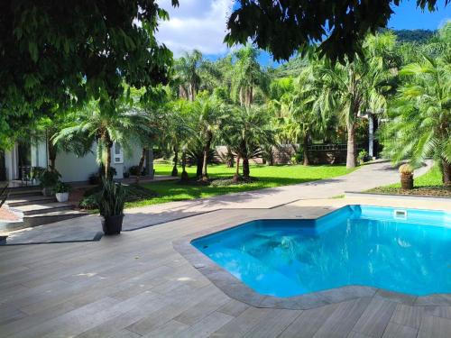 Encantado House | Casa com piscina na terra do Cristo Protetor