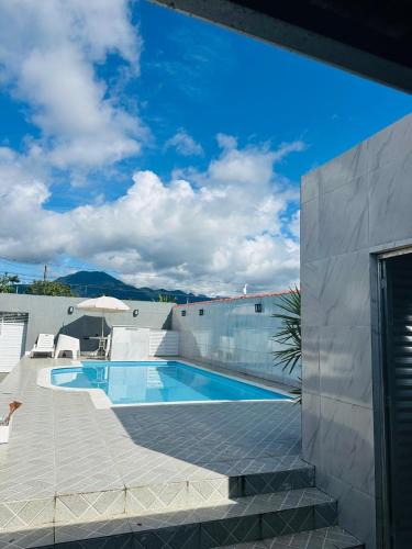 Peruibe House | CASA COM PISCINA - PeRUIBE