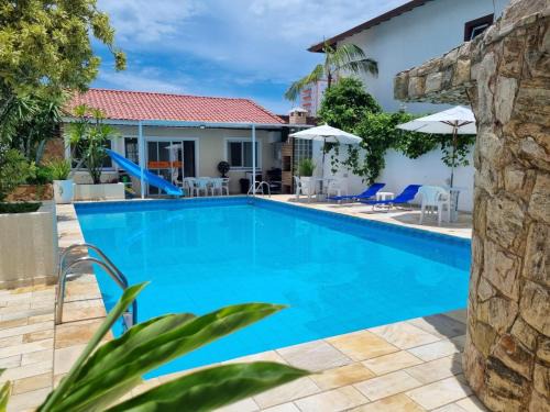 Itanhaem House | Casa com Piscina Privativa Gigante e Escorregador Pertinho da Praia com Bikes para Passeio