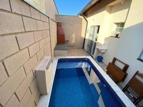 Tupy House | Casa de cond com piscina e churrasqueira particular