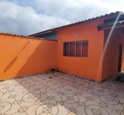 Mongagua House | Casa laranja