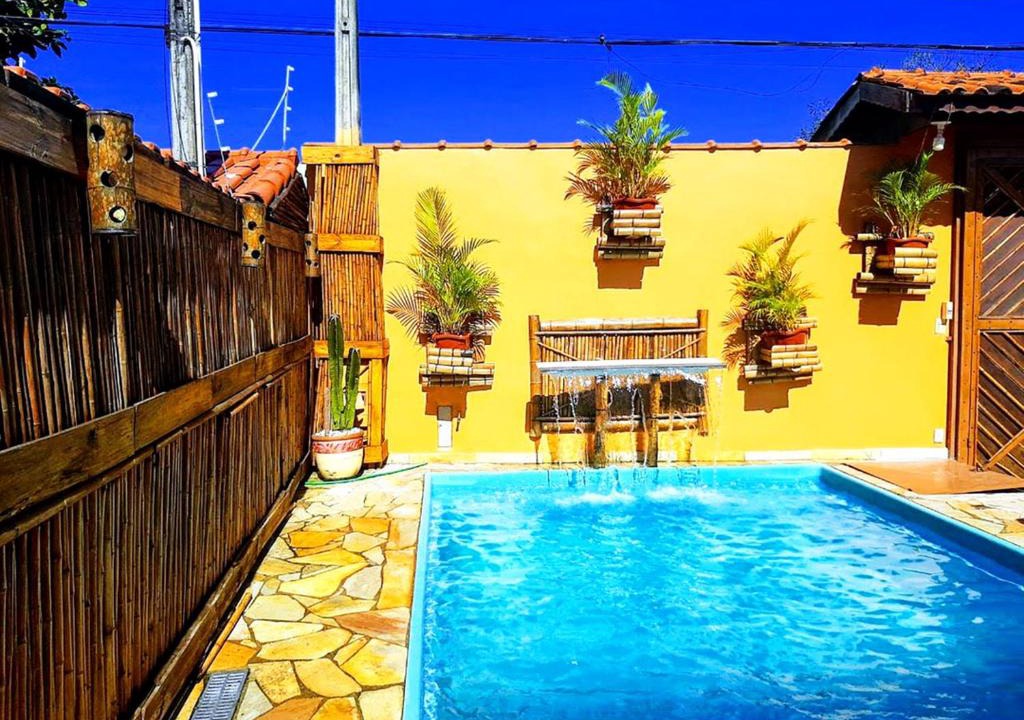 Jardim Santa Tereza House | Casa linda com Piscina e Jogos, pertinho da Praia