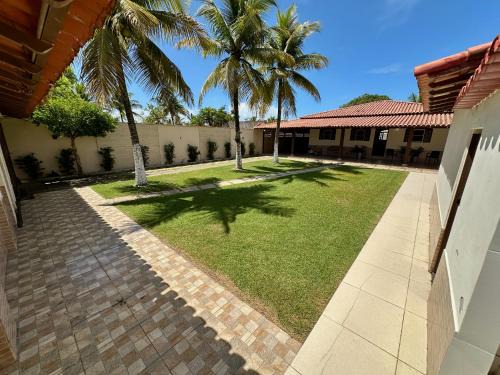 Manguinhos House | Casa O Tempo e o Vento