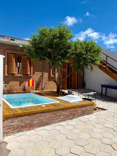 Querencia House | Casa quadra-mar com piscina
