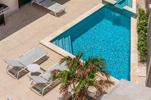 Noord Villa | CD03 - Private Villa with pool - 5min from Eagle Beach - 4BR house