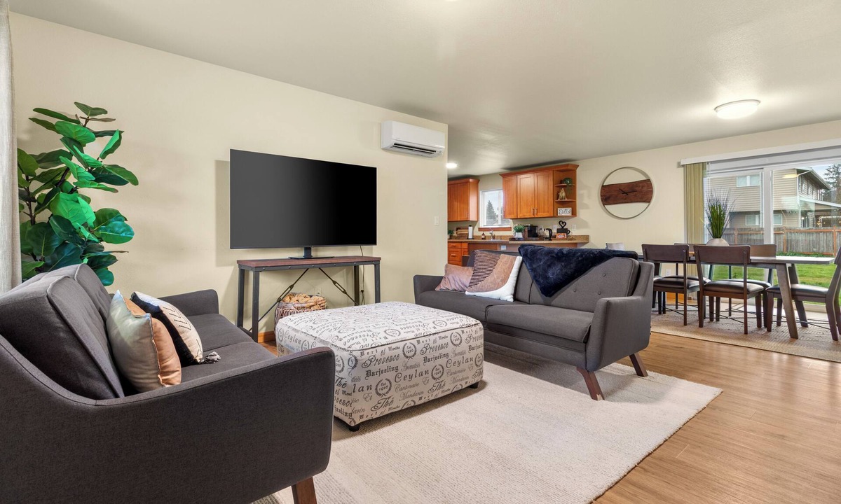 Grand Mound House | Centralia home minutes to NW Sports Hub. Modern three bedroom - primary ensuite. Two additional bedrooms with second full bathroom. Full kitchen. Fully fenced backyard with covered patio. In home laundry - full size washer/dryer. Parking - 4 cars