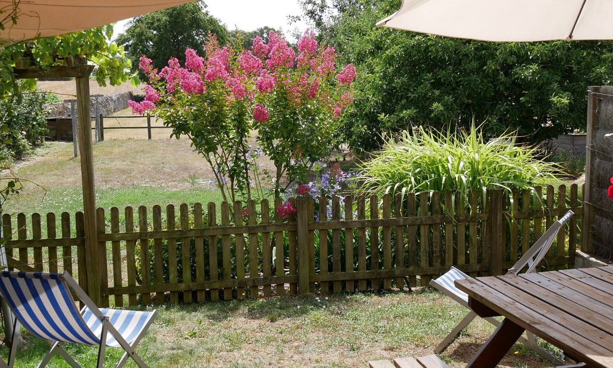 Chateau-Thebaud Cottage | Charming 15th-Century Cottage in Vineyard with Terrace, Bikes & EV Charging
