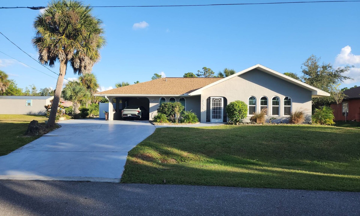 Port Charlotte House | Charming 2-bedroom house in peaceful Port Charlotte with AC and heated pool.