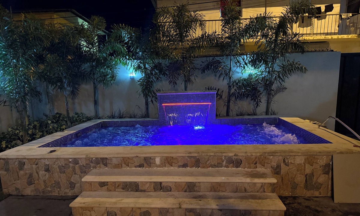 San Victor Apartment | Charming 2-bedroom apartment in San Victor Espaillat, with AC , JacuzziBackyard