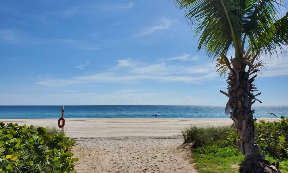 Surfside Condo | Charming 2-bedroom Luxury Condo on the sand with amazing unobstructed views.