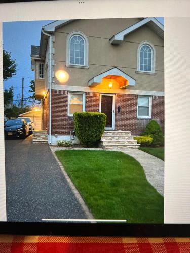 Elmont House | Charming 2 Bedroom One Block from UBS Arena!