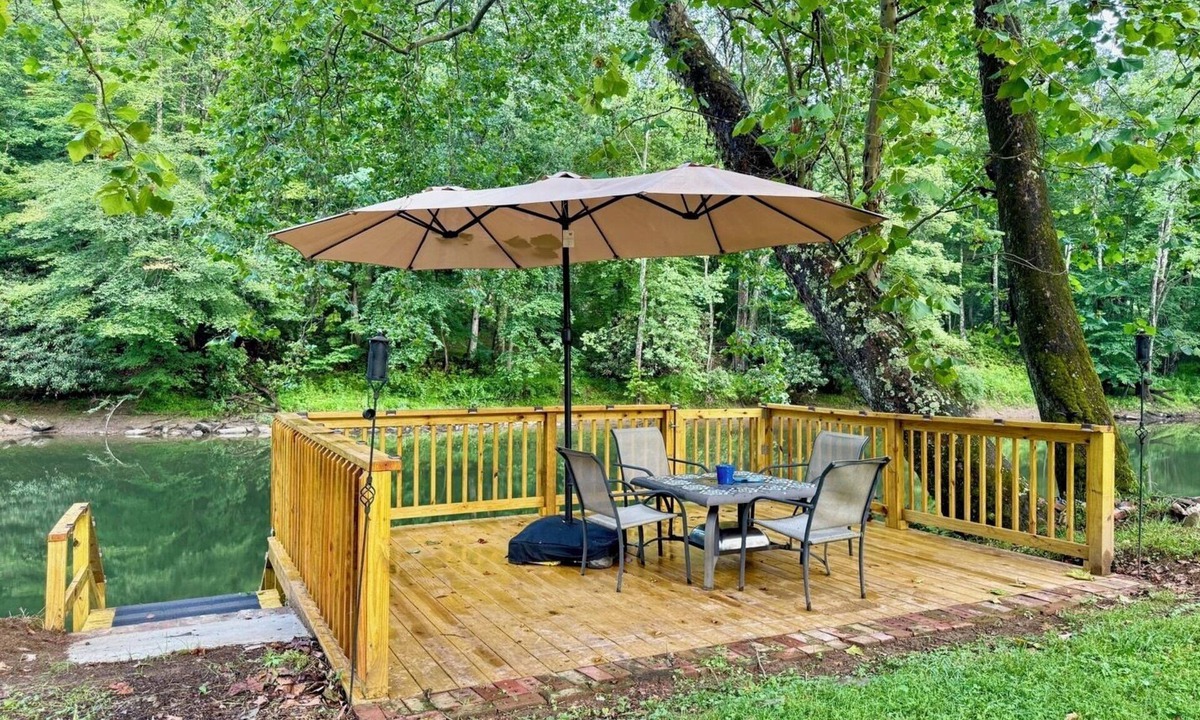 Valley Bend Cottage | Charming 2 BR, nestled on Buckhannon River, with deck, dock, fire-pit, & kayaks