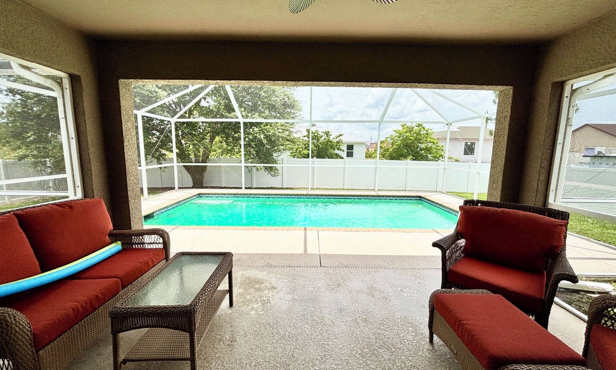 Harris House | Charming 3-bedroom house with screened in heated pool & lanai