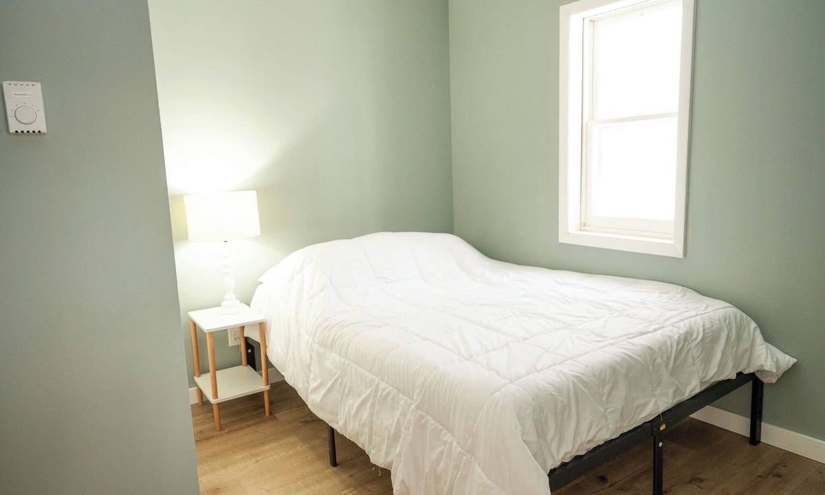 Rhinelander Cottage | Charming cottage In The Heart of Sugar Camp on Bass Lake - No Cleaning Fee!