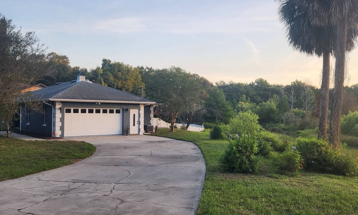 Mount Dora House | Charming lakefront 3BR 3BA house w/EV chg in heart of Mt. Dora. Nature abounds.