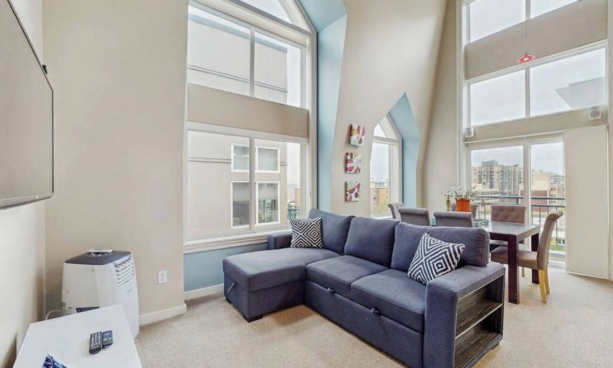 Belltown Condo | Charming top floor 2 story penthouse with Sound and Olympic views
