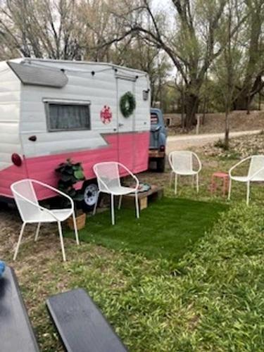Mayhill House | Charming Vintage Shasta Camper with Riverside Glamping Charm Near Pavilion Food Truck Scene in Mayhill, New Mexico
