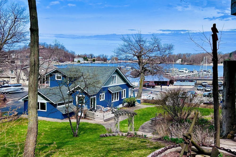 Macatawa Cottage | Charming Waterfront Cottage with Modern Remodel Overlooking Lake Macatawa Harbor, Near Macatawa, Michigan