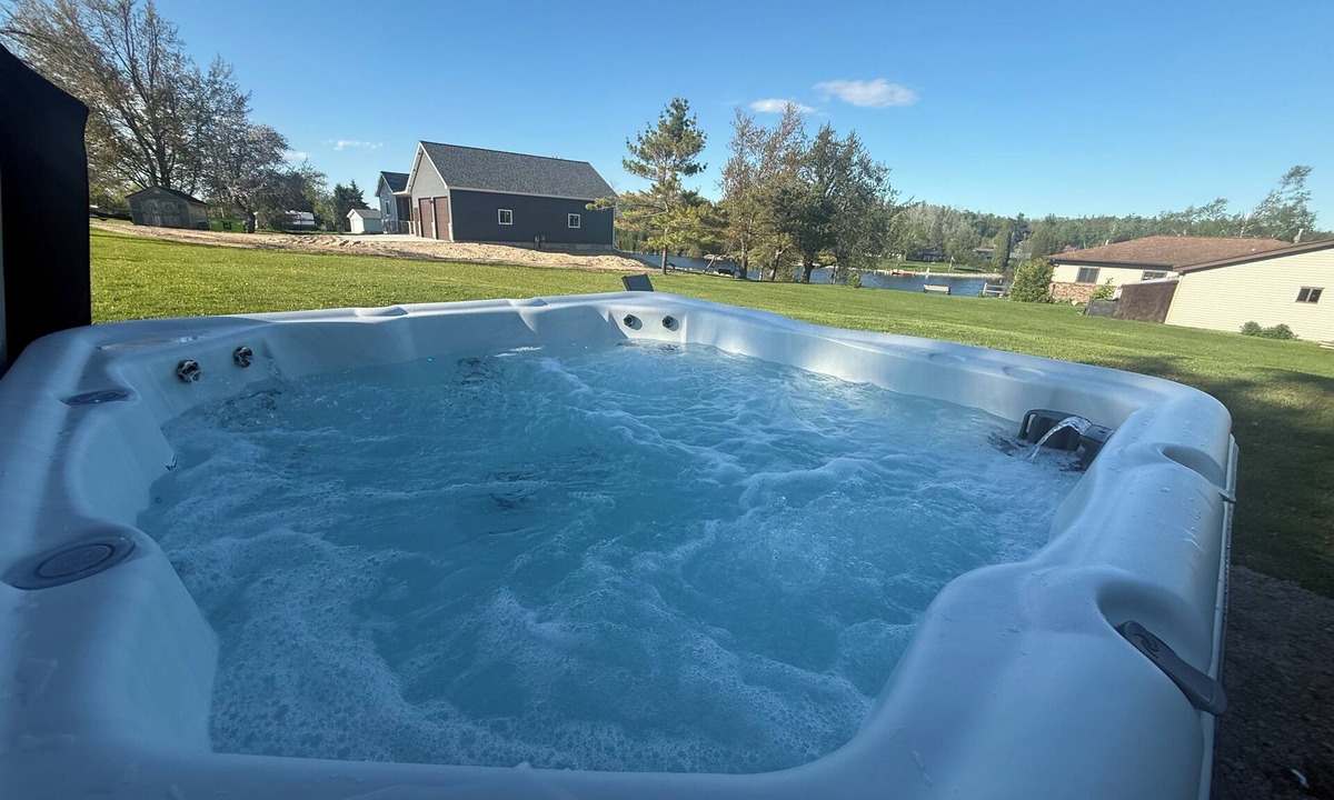 Cheboygan House | Cheboygan River glow with fire pit/game room/hot tub! min to boat launch/beaches