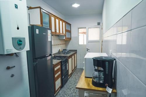 La Perla Apartment | Check and Home - Mitre - 5 Huéspedes con Balcón a la Calle, Patio y Parrilla