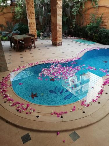 The 5th Settlement Villa | Cheerful standalone villa with pool and waterfall