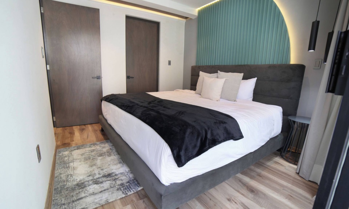 Colonia Cuauhtemoc Apartment | Chic CDMX Haven: Pop Modern Elegance Meets Roma's