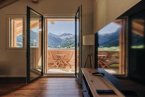 Adelboden Apartment | Chuenislodge2- zwei Balkone, gemütlicher Kamin, top Aussicht
